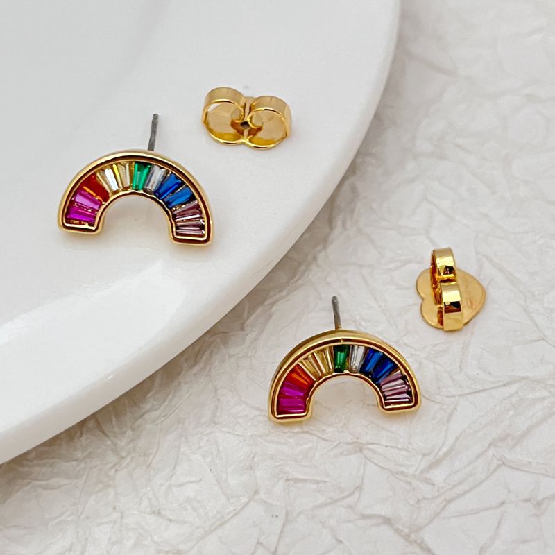  Macro shot focused on the ring pendant, highlighting each of the seven colored crystals and their sparkle.