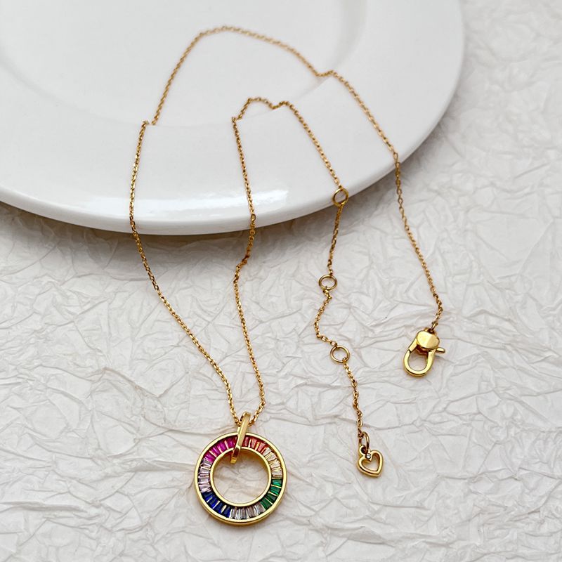  Vibrant shot of the necklace on a clean, white or light grey background, making the rainbow colors pop.