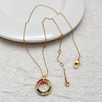  Vibrant shot of the necklace on a clean, white or light grey background, making the rainbow colors pop.