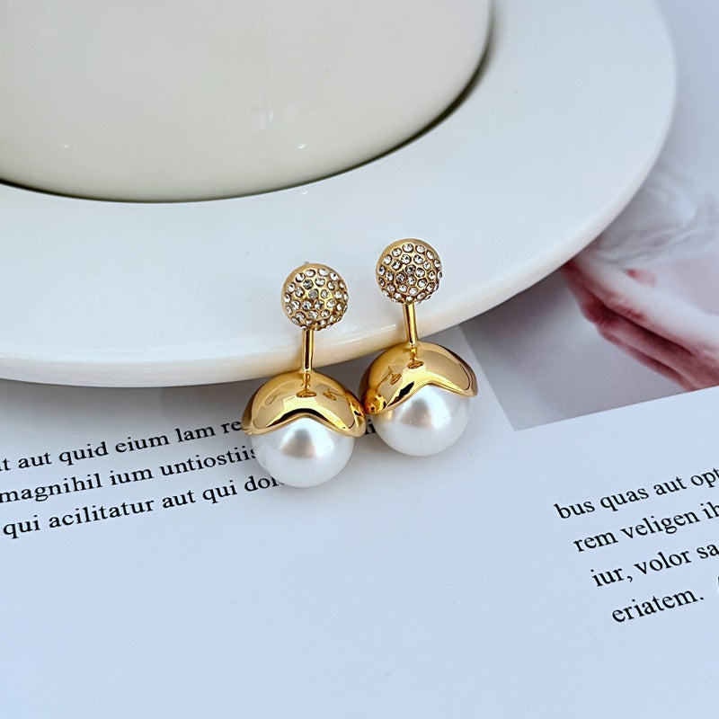 Earrings on a soft blush or cream background, showcasing the luminous faux pearl with crystal-accented cap. Alt: “Kate Spade Dainty Sparklers Faux Pearl Earrings – Crystal & Pearl Drop Jewelry.”