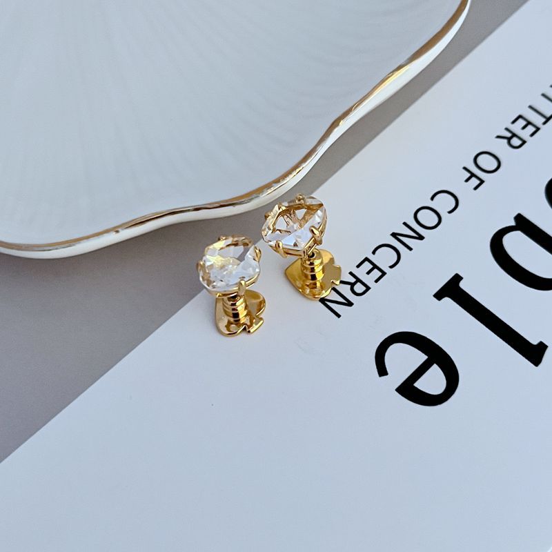 Earrings on a soft white or pale blue background, highlighting the light blue enamel disc with gold "Rise and Shine" lettering. Alt: “Kate Spade Light Blue Rise and Shine Earrings – Blue and Gold Inspirational Jewelry.”