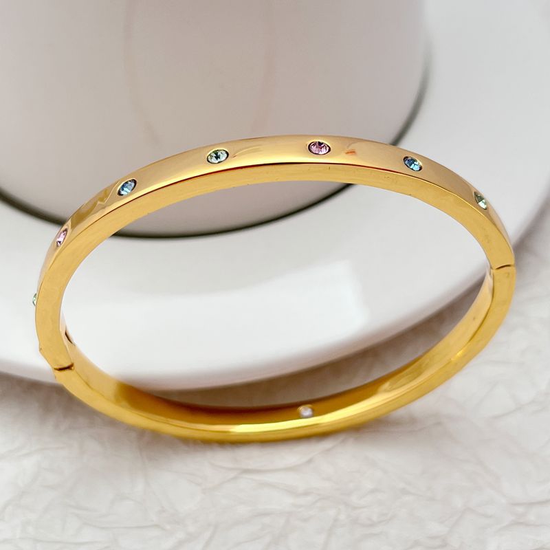  Bracelet on a clean white or soft blush background, rainbow crystals catching the light. Alt: “Kate Spade Multi Color Crystal Hinge Bracelet – Rainbow Crystal Bangle.”