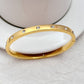 Bracelet on a clean white or soft blush background, rainbow crystals catching the light. Alt: “Kate Spade Multi Color Crystal Hinge Bracelet – Rainbow Crystal Bangle.”