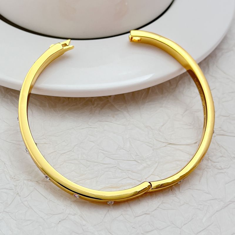  Bracelet on a clean white or soft blush background, rainbow crystals catching the light. Alt: “Kate Spade Multi Color Crystal Hinge Bracelet – Rainbow Crystal Bangle.”