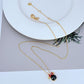 Necklace displayed on a clean, light background (white or pale pink), showing the Minnie slider charm positioned mid-chain. Alt: “Kate Spade New York Minnie Slider Necklace – Disney-Inspired Gold Charm Jewelry.”
