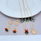 Necklace displayed on a clean, light background (white or pale pink), showing the Minnie slider charm positioned mid-chain. Alt: “Kate Spade New York Minnie Slider Necklace – Disney-Inspired Gold Charm Jewelry.”