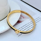 Bracelet on a clean white or light grey background, highlighting the pearl and crystal details. Alt: “Kate Spade New York White Bracelet – Pearl and Crystal Statement Jewelry.”