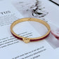 Bracelet on a clean white or light grey background, highlighting the pearl and crystal details. Alt: “Kate Spade New York White Bracelet – Pearl and Crystal Statement Jewelry.”