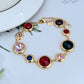 Bracelet on a clean white or soft pastel background, highlighting the raised enamel dots and gold-tone metal. Alt: “Kate Spade On The Dot Bracelet – Colorful Polka Dot Enamel Jewelry.”