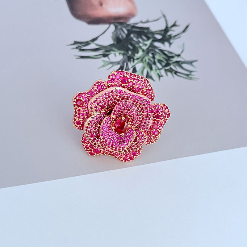  Ring on soft blush or velvet background. Alt: “Kate Spade Rosy Statement Ring – Pink Enamel Flower Jewelry.”