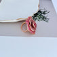  Ring on soft blush or velvet background. Alt: “Kate Spade Rosy Statement Ring – Pink Enamel Flower Jewelry.”