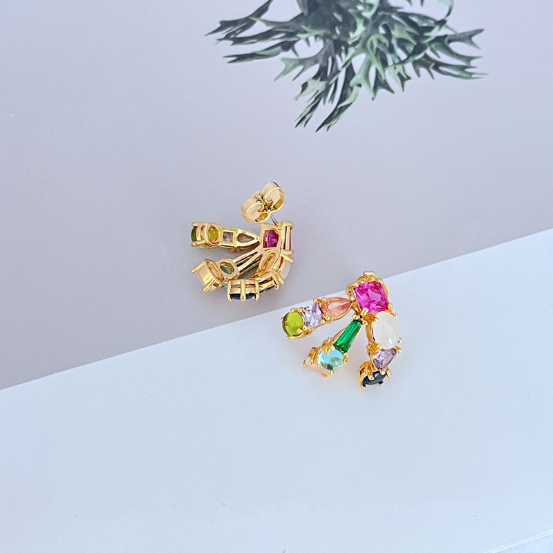 Earrings on a clean white or soft grey background, showcasing the crystal pavé along the huggie hoop. Alt: “Kate Spade Showtime Stud Huggie Hoops – Pavé Crystal Mini Hoop Earrings.”