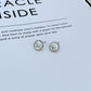  Earrings on a clean white or soft grey background, showcasing the crystal-pavé spade shape. Alt: “Kate Spade Spot The Spade Gold Tone Crystal Stud Earrings – Pavé Spade Jewelry.”