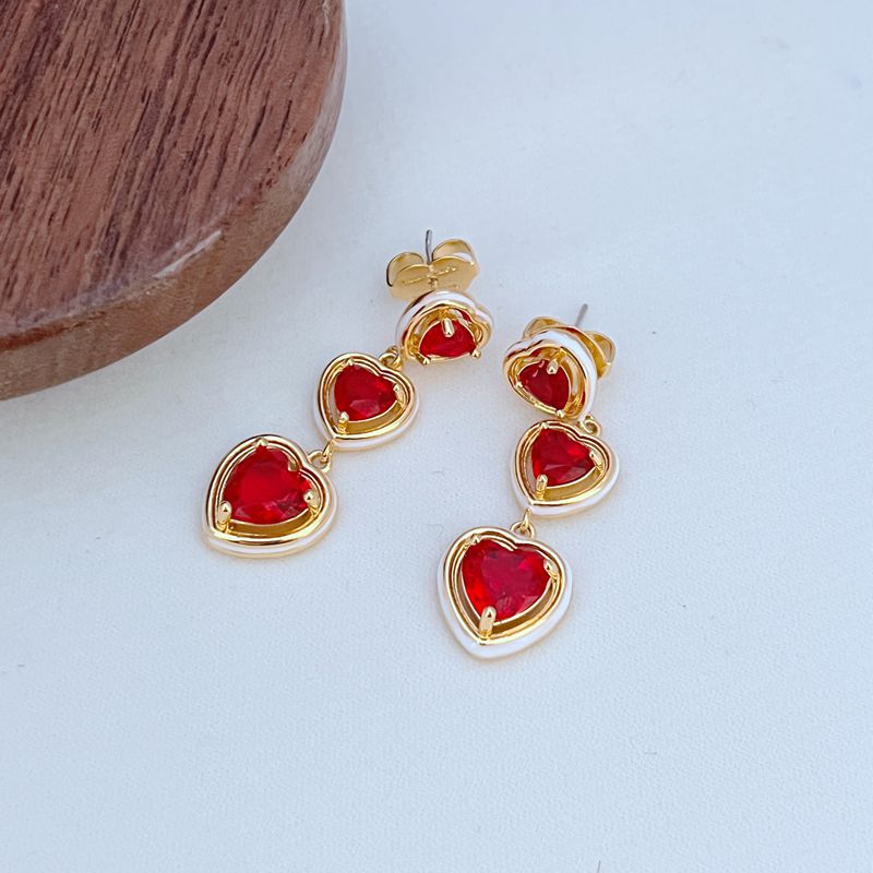 Clean shot of the bracelet laid flat or slightly curved, on a neutral background, clearly showing the line of heart charms.