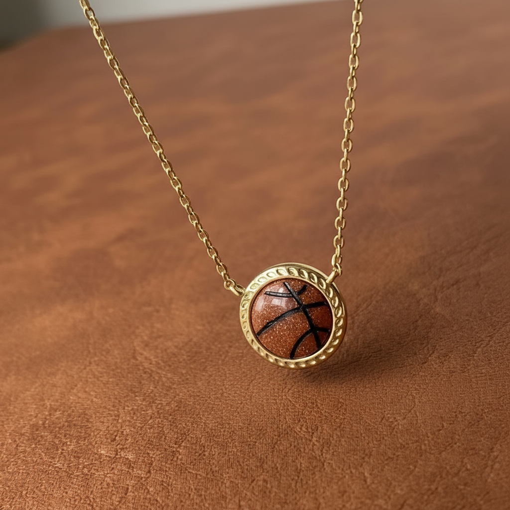 Necklace with a basketball pendant on a brown surface