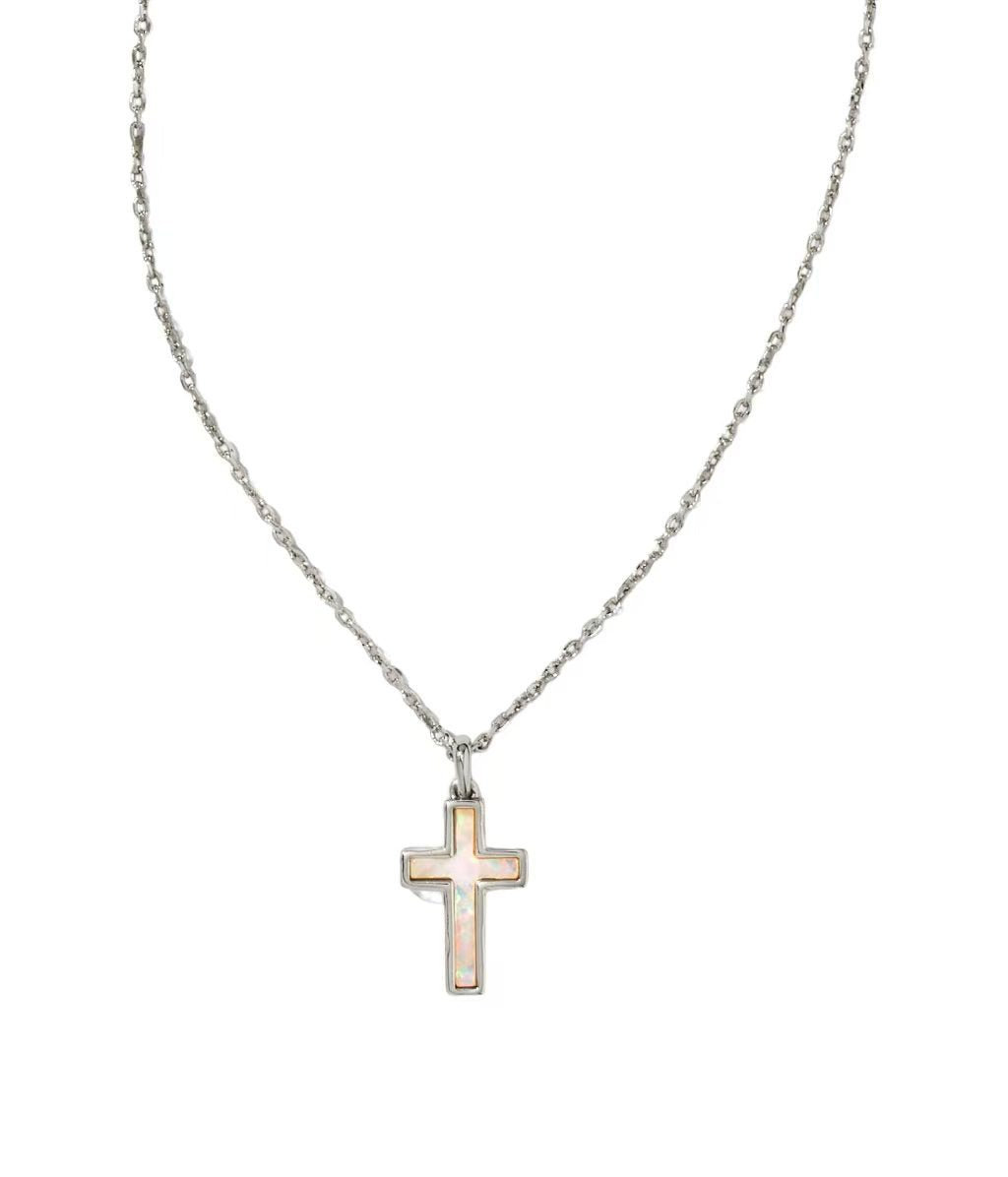 Clean, simple shot of the necklace laid flat or worn, against a plain background, clearly showing the cross pendant and chain.
