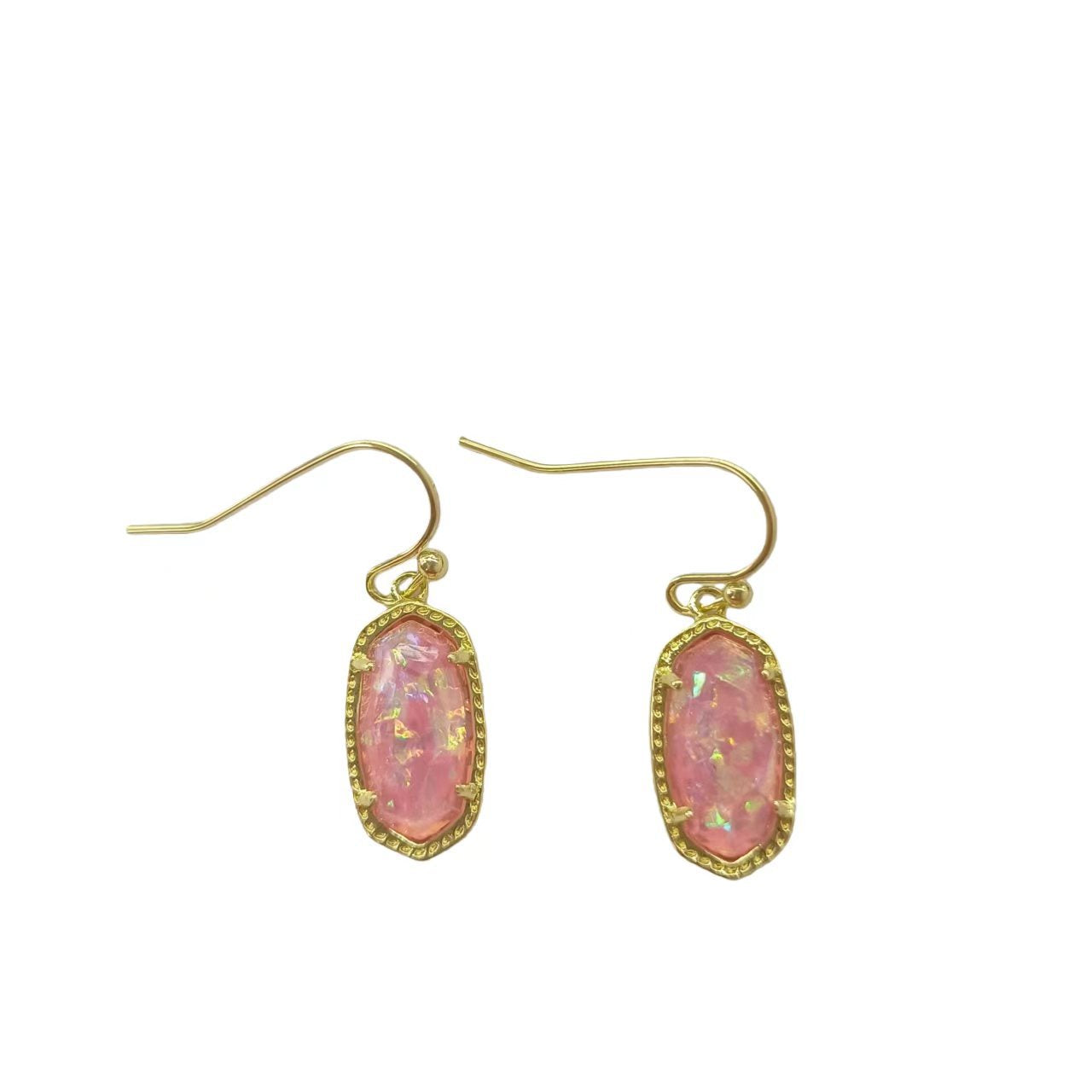  A woman with a calm, serene demeanor, wearing the earrings with a simple blouse or dress, capturing the gentle, feminine energy.