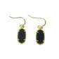Clean shot of the earrings against a soft, neutral background, showcasing the rose quartz stone and gold setting.
