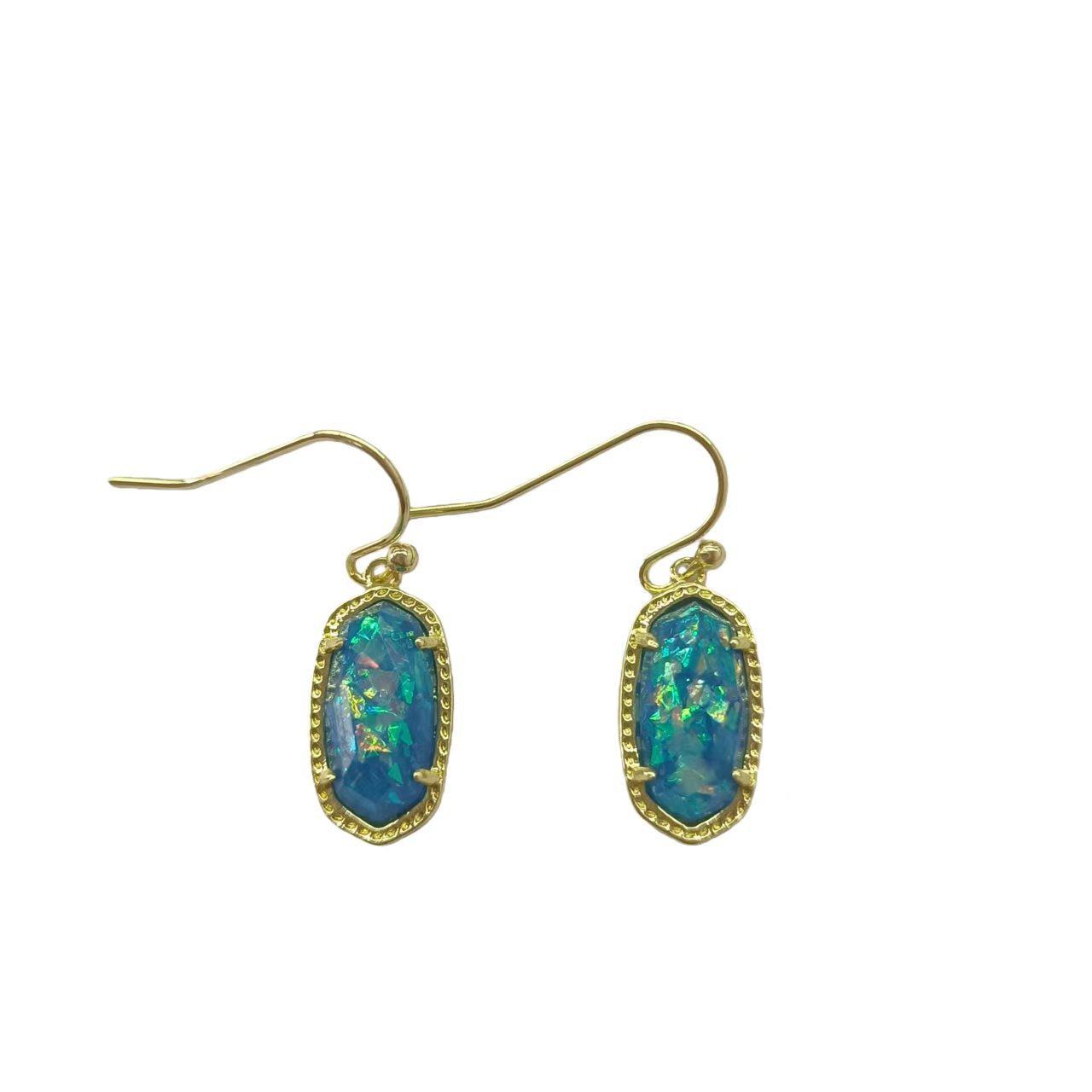 Clean shot of the earrings against a soft, neutral background, showcasing the rose quartz stone and gold setting.