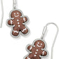 Macro shot focused on the gingerbread charm, showcasing the cute face, button details, and textured "icing" etchings.