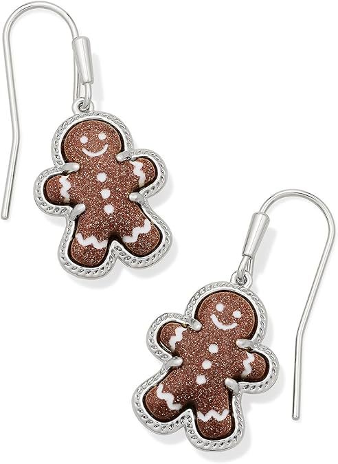 Macro shot focused on the gingerbread charm, showcasing the cute face, button details, and textured "icing" etchings.