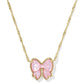 Clean shot of the necklace laid flat or worn, against a light background, clearly showing the bow pendant and short chain length.