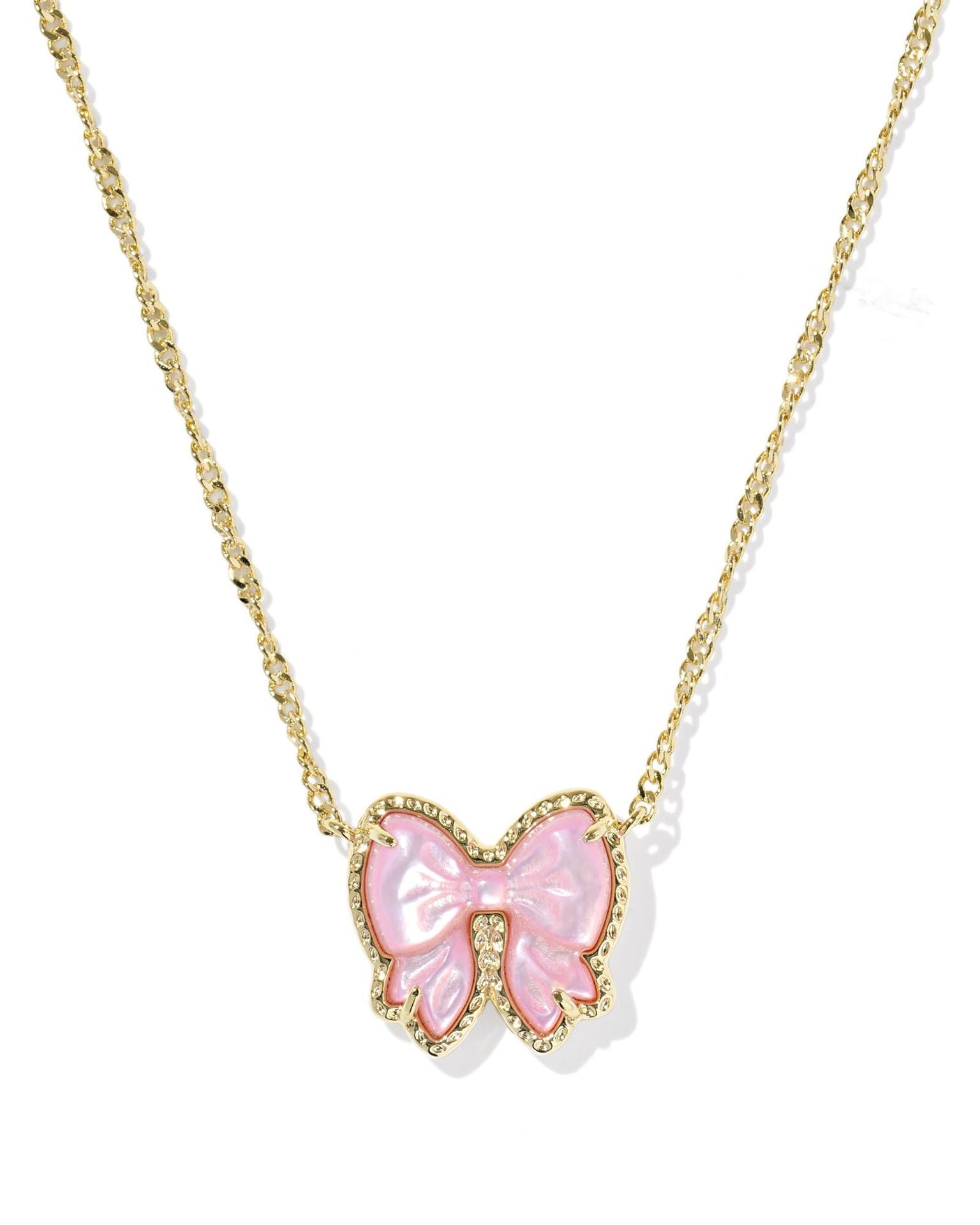 Clean shot of the necklace laid flat or worn, against a light background, clearly showing the bow pendant and short chain length.
