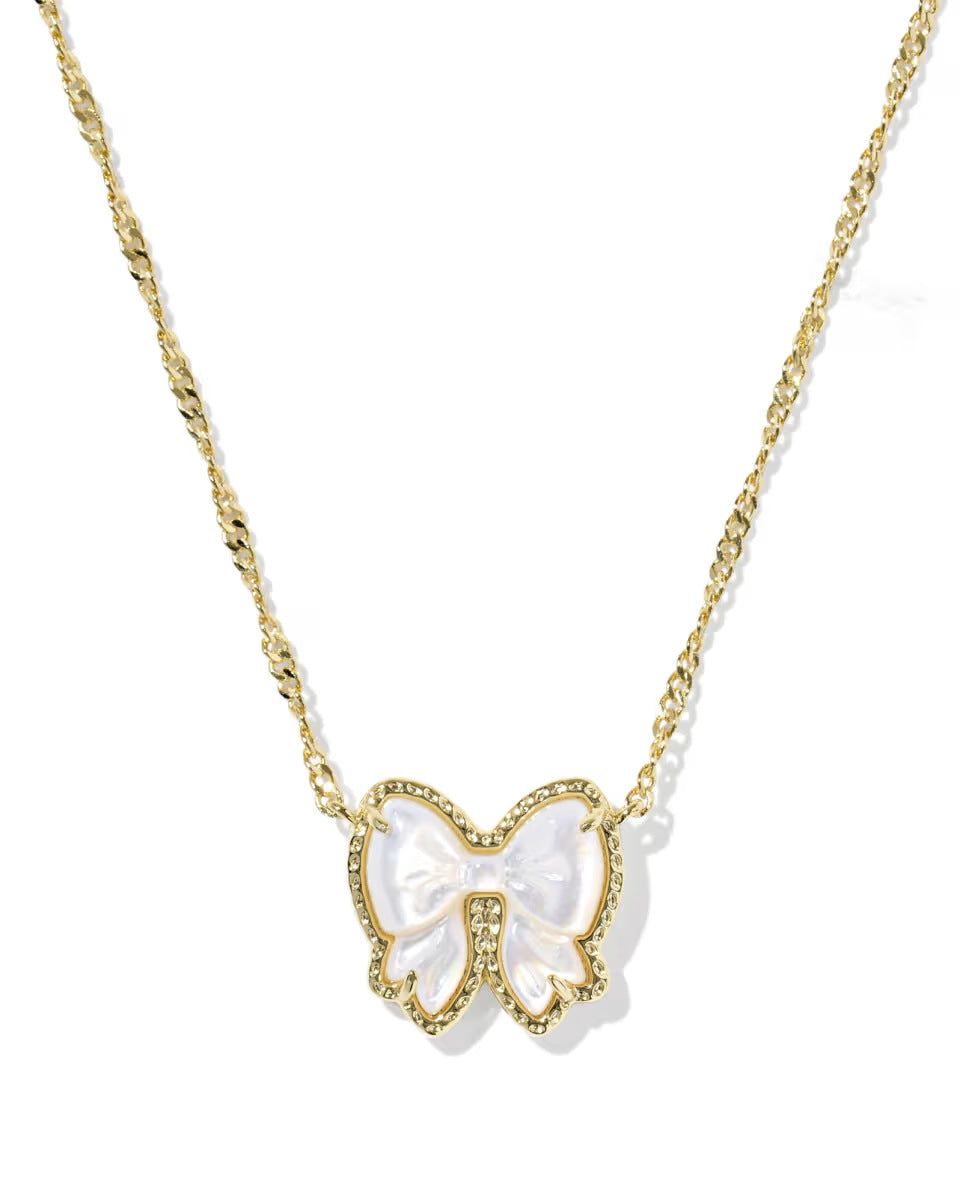 Clean shot of the necklace laid flat or worn, against a light background, clearly showing the bow pendant and short chain length.
