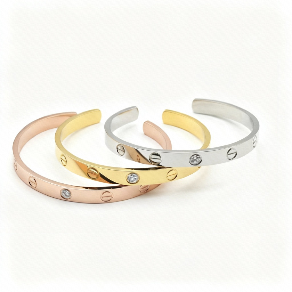 LOVE Bangle Bracelet | 18K Gold-Plated Sterling Silver Three gold and silver bangles with diamond accents on a white background