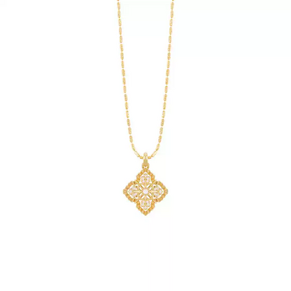Gold necklace with a diamond pendant on a white background
