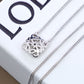  Macro shot from the side, showcasing the pendant's rounded, convex profile and depth.