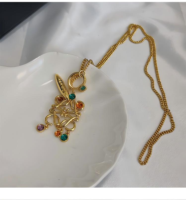 Vibrant, high-resolution shot of the necklace against a clean, neutral background to make the colorful stones the absolute focal point.