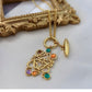 Vibrant, high-resolution shot of the necklace against a clean, neutral background to make the colorful stones the absolute focal point.