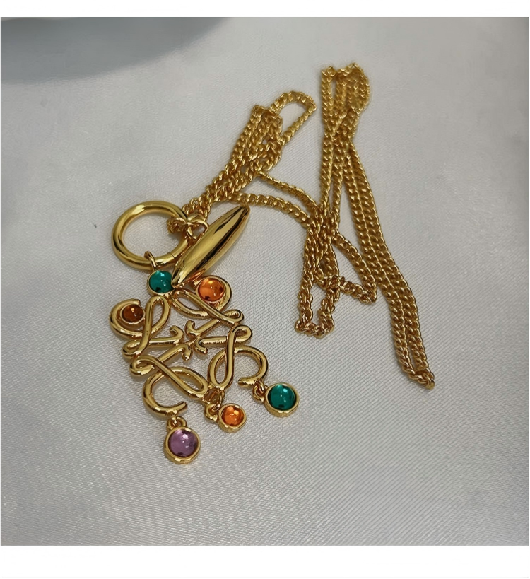 Vibrant, high-resolution shot of the necklace against a clean, neutral background to make the colorful stones the absolute focal point.