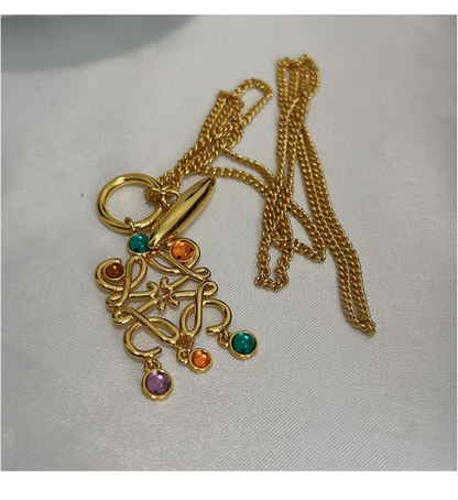 Vibrant, high-resolution shot of the necklace against a clean, neutral background to make the colorful stones the absolute focal point.