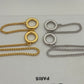  Lifestyle image of the necklace being worn over a plain cashmere sweater or turtleneck, demonstrating its intended style.