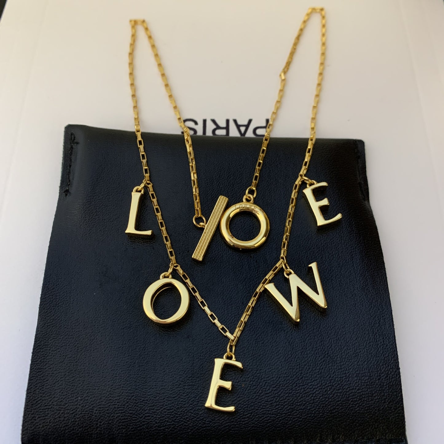 Strong, clean shot of the necklace laid flat or coiled, highlighting the size and design of the bold links against a neutral background.