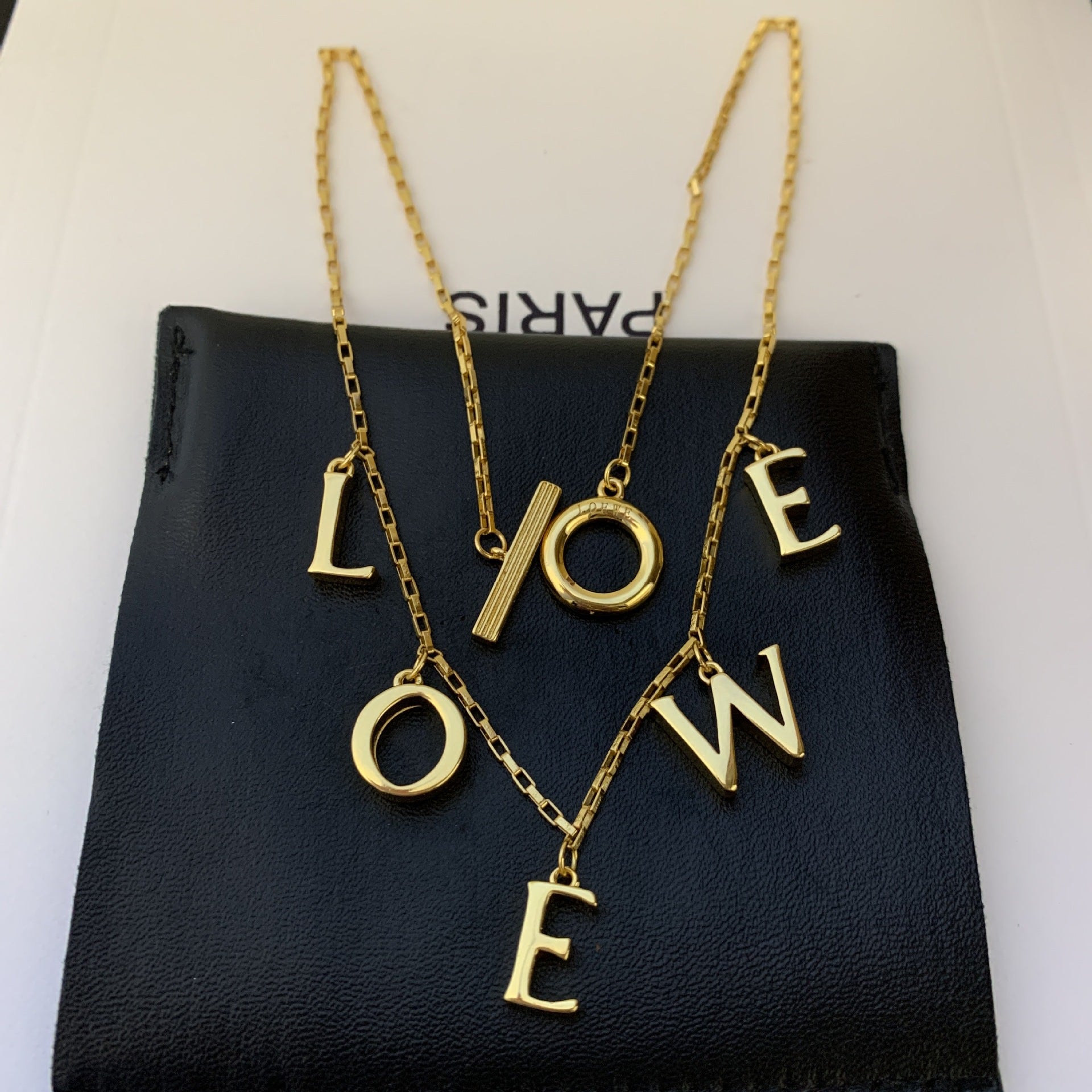 Strong, clean shot of the necklace laid flat or coiled, highlighting the size and design of the bold links against a neutral background.