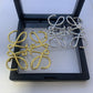  Image showing the brooch creatively styled on a handbag strap, a beret, or a plain scarf.
