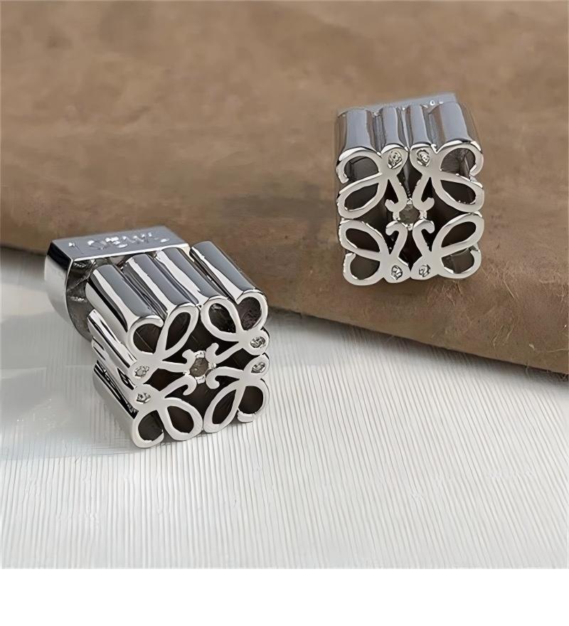 Close-up focusing on the geometric pattern and smooth finish of the metal.