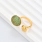 Clean, angled shot of the ring on a finger or stand, showcasing the square silhouette and intricate hollow pattern against a solid background.