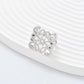 Clean, angled shot of the ring on a finger or stand, showcasing the square silhouette and intricate hollow pattern against a solid background.