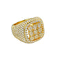Gold ring with diamond accents on a white background