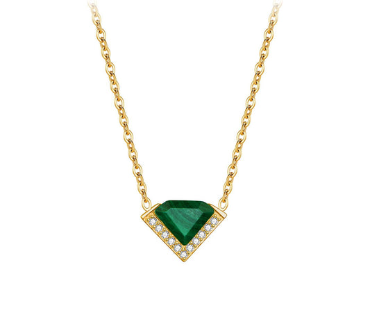 Gold necklace with a green gemstone pendant on a white background