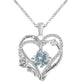 Heart-shaped silver pendant with blue gemstone and 'I love you' engraving on a white background