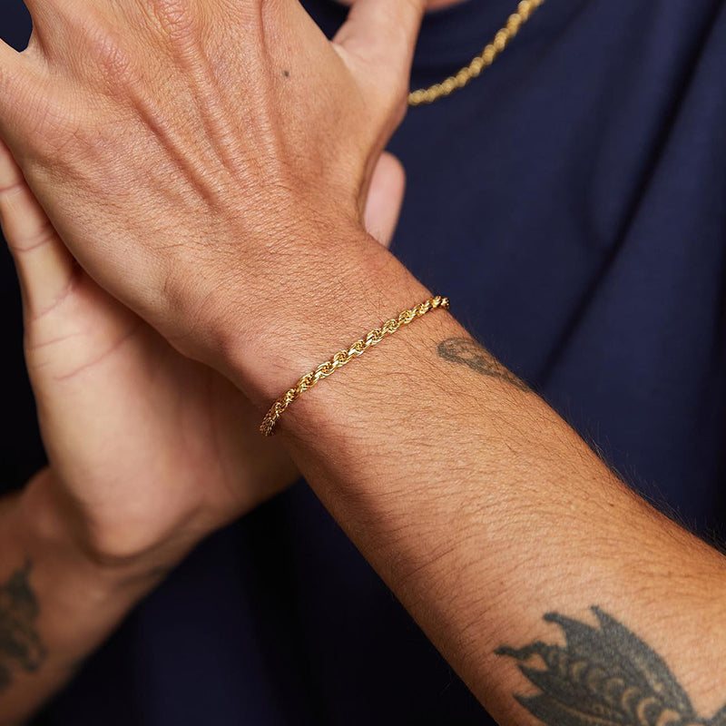 “Close-up of twisted rope chain texture in gold-plated sterling silver bracelet”