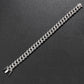 High-definition shot of the bracelet laid flat and fully extended on pure white background.
