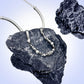 “Macro shot of polished S925 silver necklace craftsmanship texture”