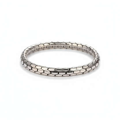 Minimalist Snake Pattern BraceletSilver bracelet with honeycomb pattern on a white background