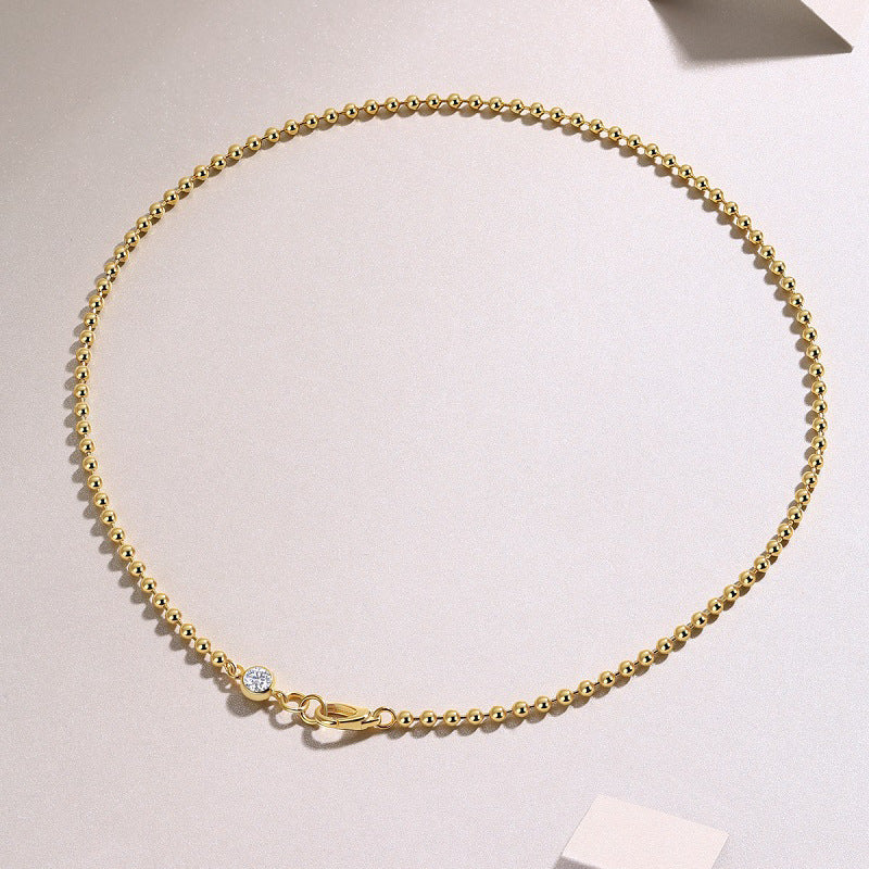 High-definition shot of the necklace laid flat on pure white.